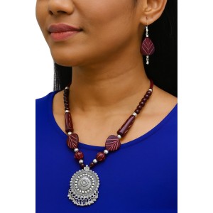 Handmade Beaded Necklace Set for Women with Oxidised Silver Pendant & Matching Earrings | Tribal Ethnic Jewellery | Boho Statement Necklace for Festive & Casual Wear Handmade Beaded Necklace Set for Women with Oxidised Silver Pendant & Matching Earrings | Tribal Ethnic Jewellery | Boho Statement Necklace for Festive & Casual Wear